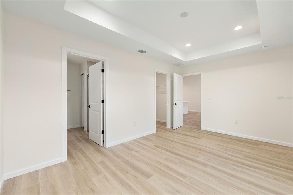 14769 Southwest 24th Place Ocala, FL 34481 - Photo 18 of 33 a view of empty room with wooden floor
