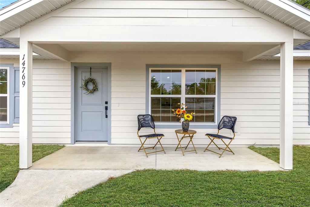 14769 Southwest 24th Place Ocala, FL 34481 - Photo 2 of 33 a house view with outdoor seating space