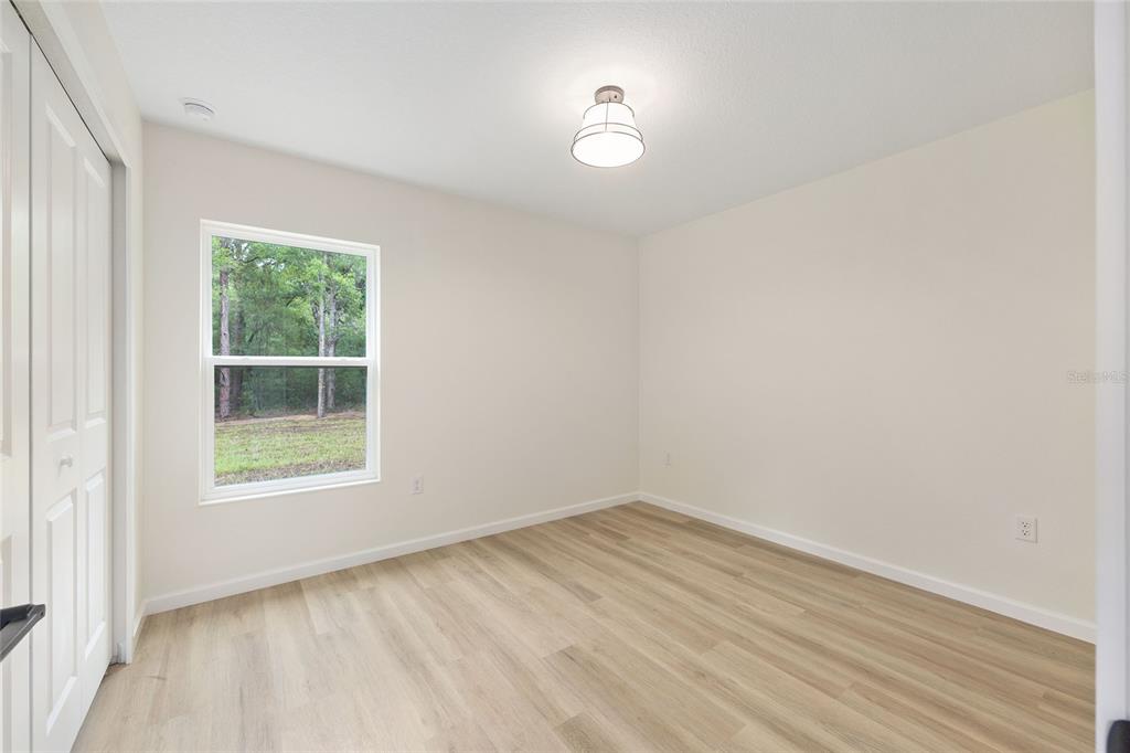 14769 Southwest 24th Place Ocala, FL 34481 - Photo 24 of 33 an empty room with a window