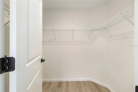 a view of a room with racks on the wall