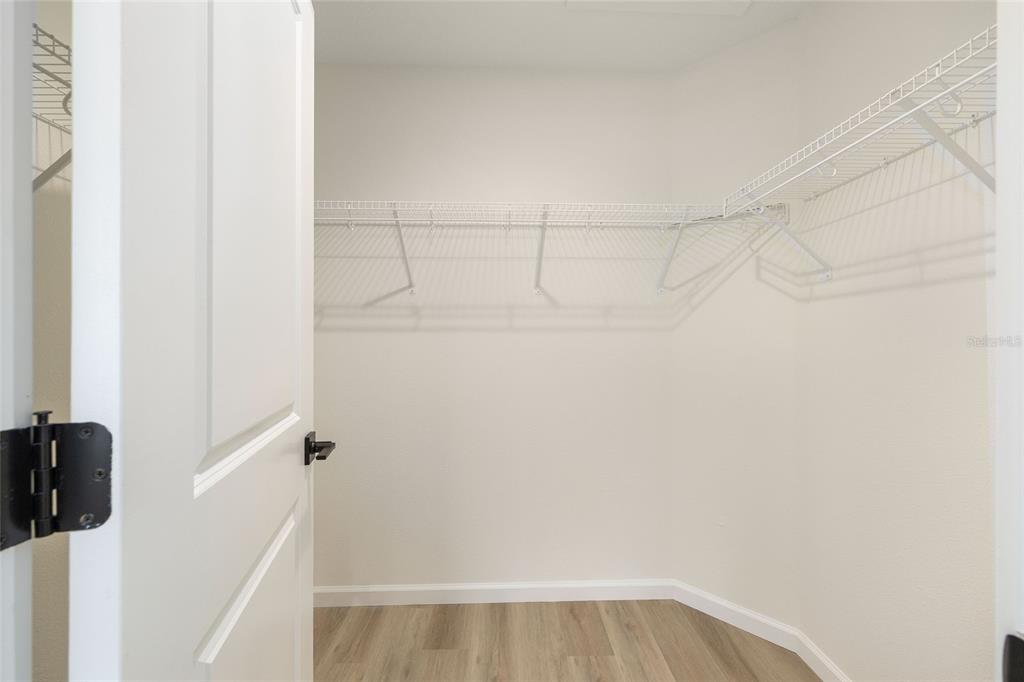 14769 Southwest 24th Place Ocala, FL 34481 - Photo 26 of 33 a view of a room with racks on the wall