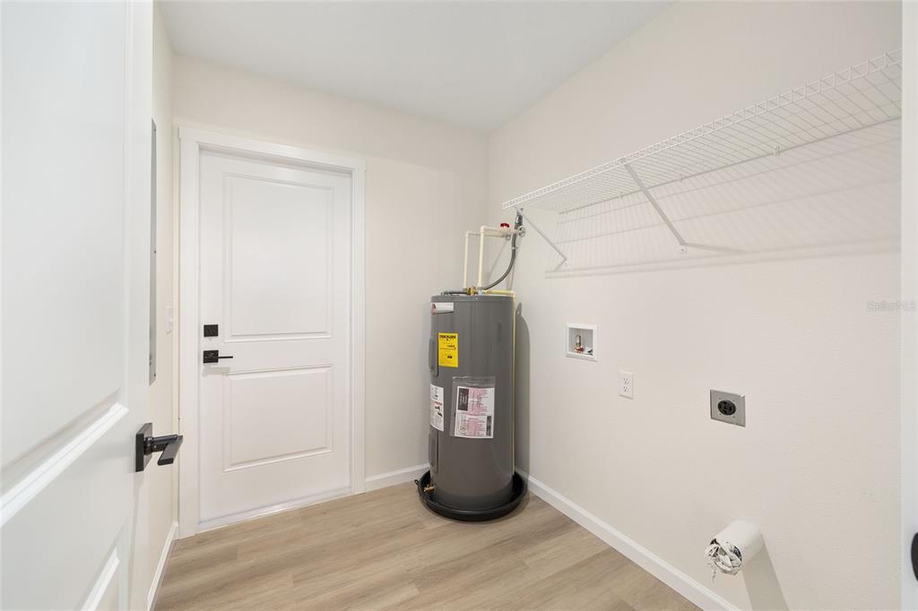14769 Southwest 24th Place Ocala, FL 34481 - Photo 27 of 33 a view of water heater room