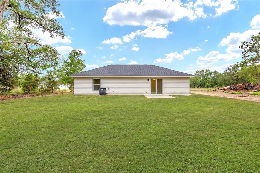 14769 Southwest 24th Place Ocala, FL 34481 - Photo 29 of 33 a front view of house with yard and green space