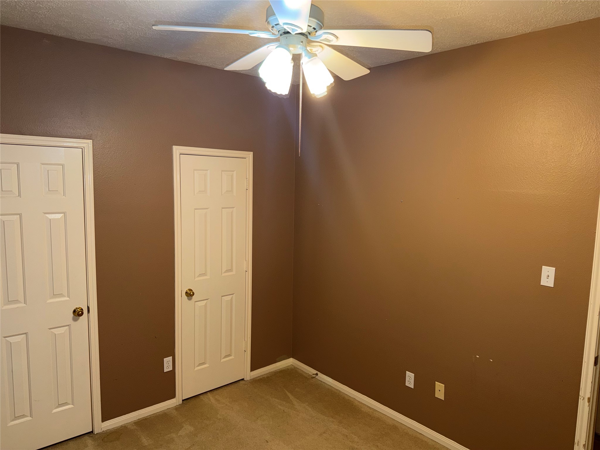3006 Spring Fair Court Spring, TX 77388 - Photo 13 of 18 an empty room with a fan and a fan