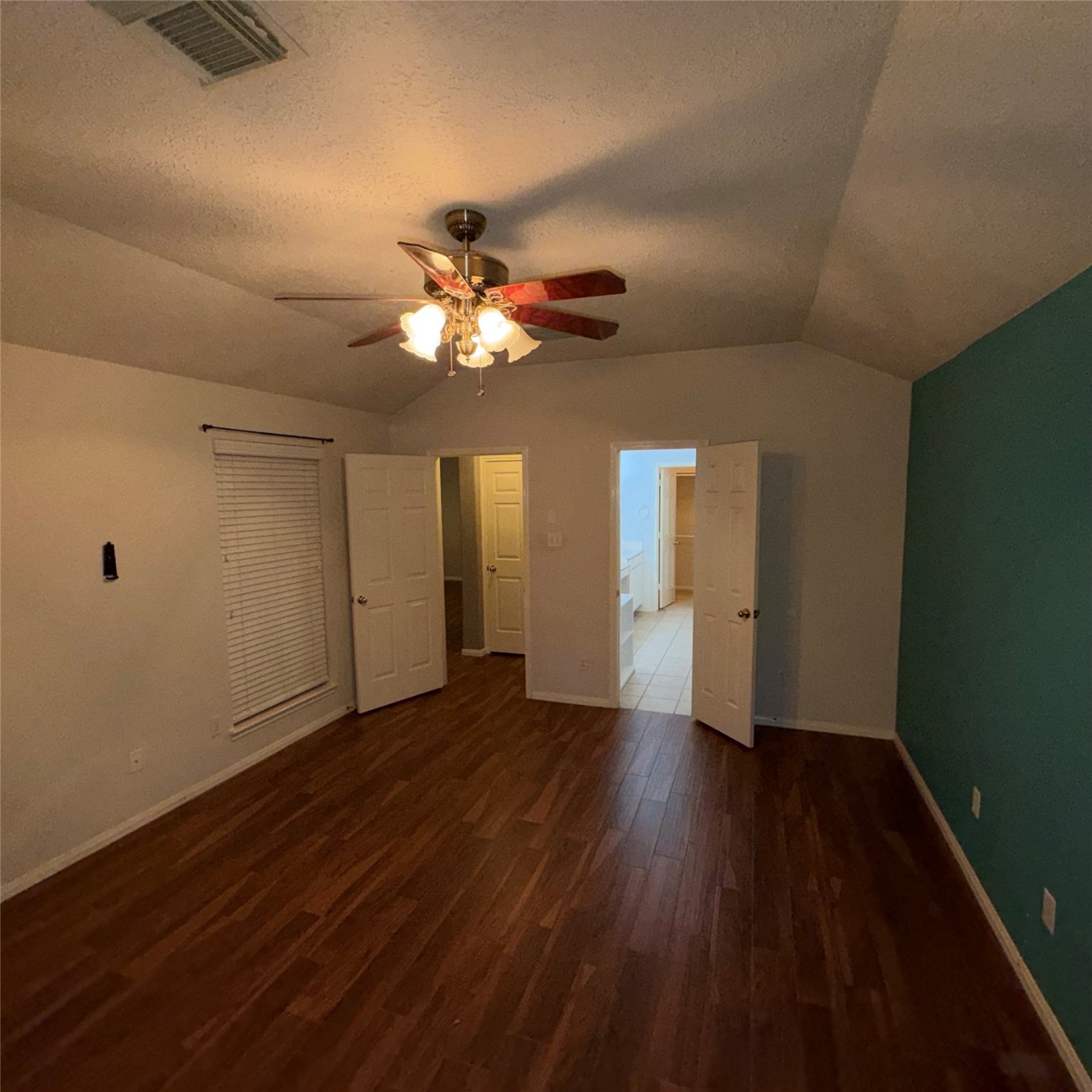 3006 Spring Fair Court Spring, TX 77388 - Photo 18 of 18 a view of an empty room with a window and wooden floor