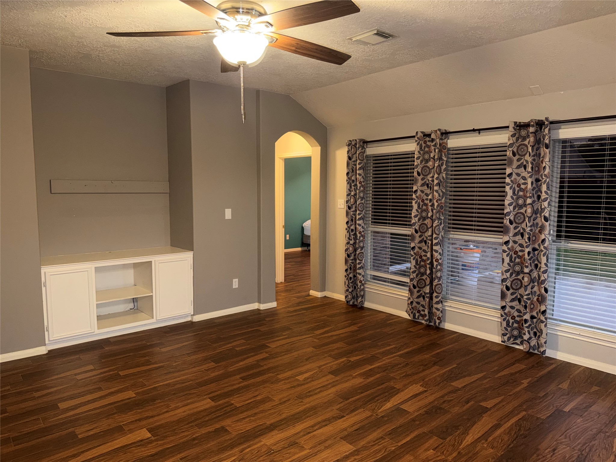 3006 Spring Fair Court Spring, TX 77388 - Photo 5 of 18 wooden floor in an empty room with a window