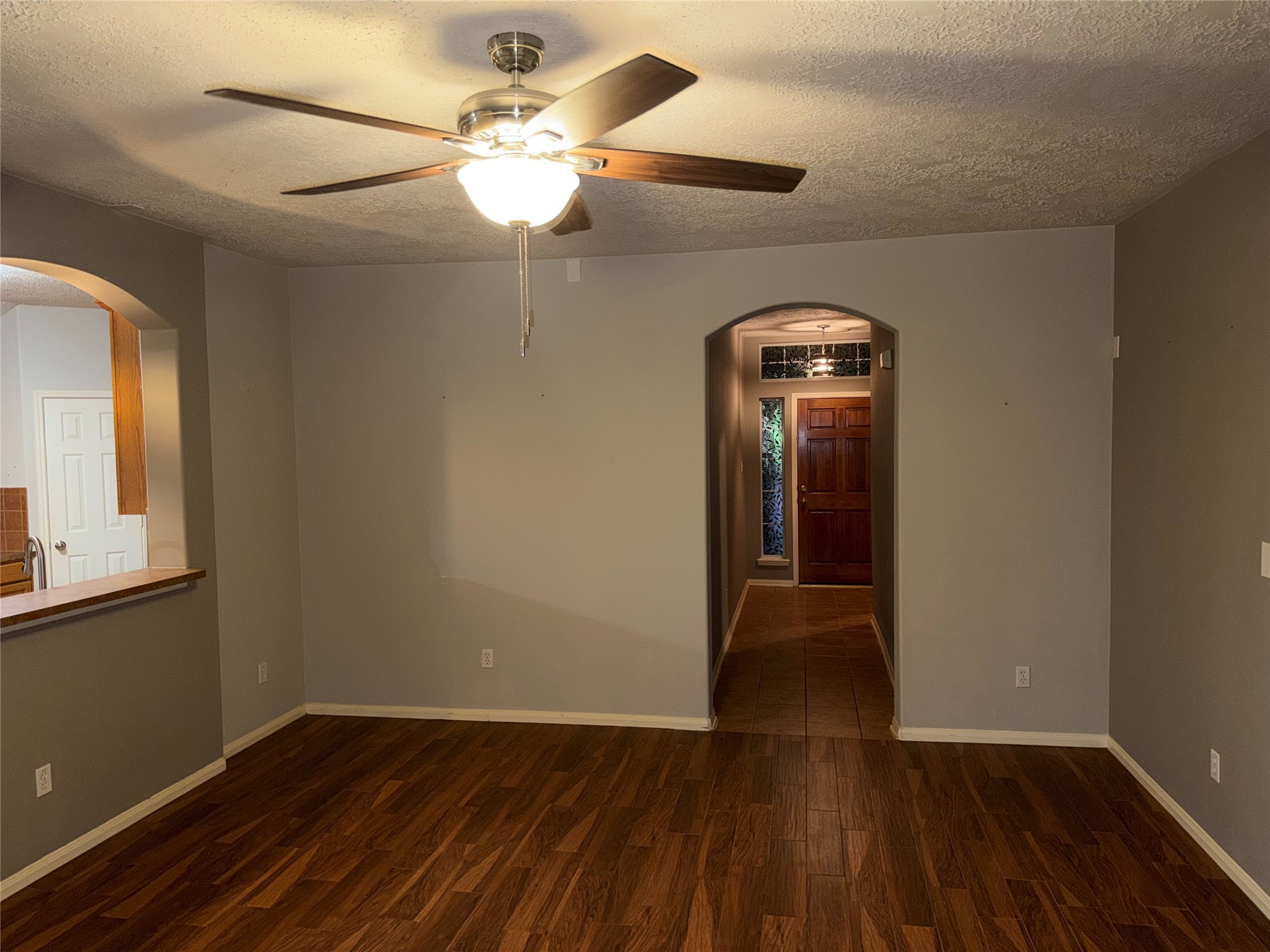 3006 Spring Fair Court Spring, TX 77388 - Photo 7 of 18 wooden floor in a hall with a window
