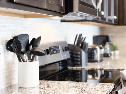 a bathroom with a bathtub and a window