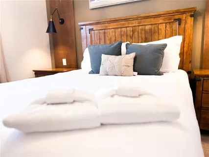 a outdoor dining space with furniture and wooden floor