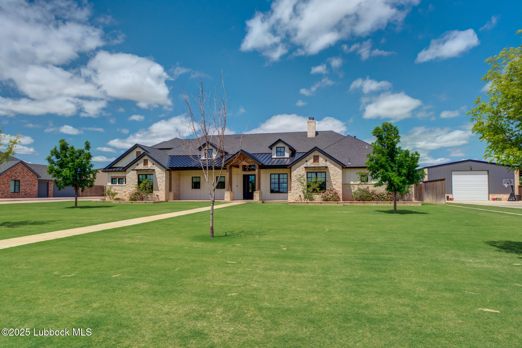 5004 County Road 7640 Lubbock, TX 79424 - Photo 1 of 79 a front view of house with yard and green space