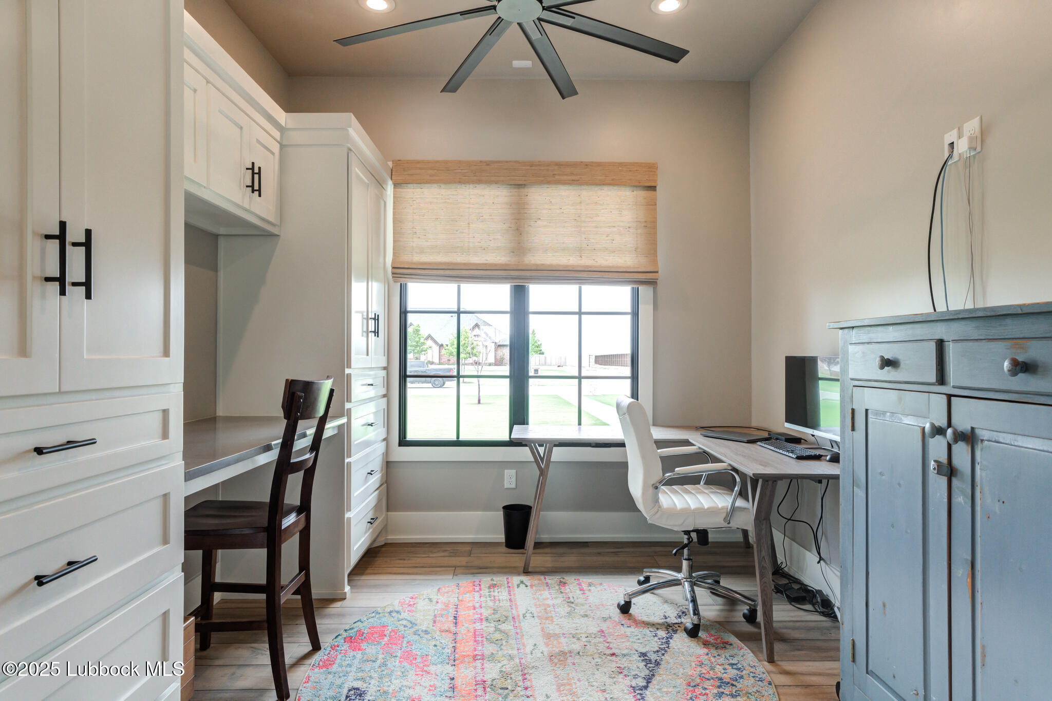 5004 County Road 7640 Lubbock, TX 79424 - Photo 13 of 79 a view of a workspace with furniture and a window