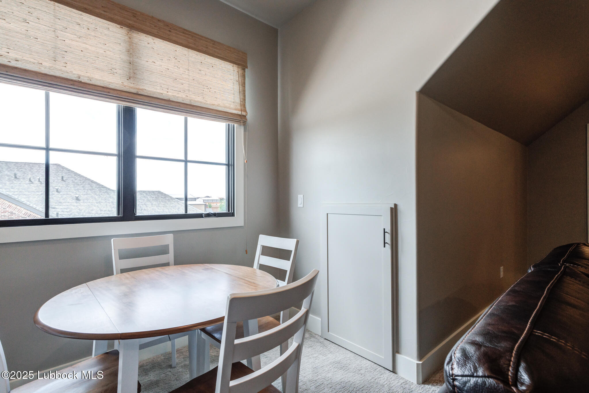 5004 County Road 7640 Lubbock, TX 79424 - Photo 33 of 79 a view of a dining room with furniture and a window