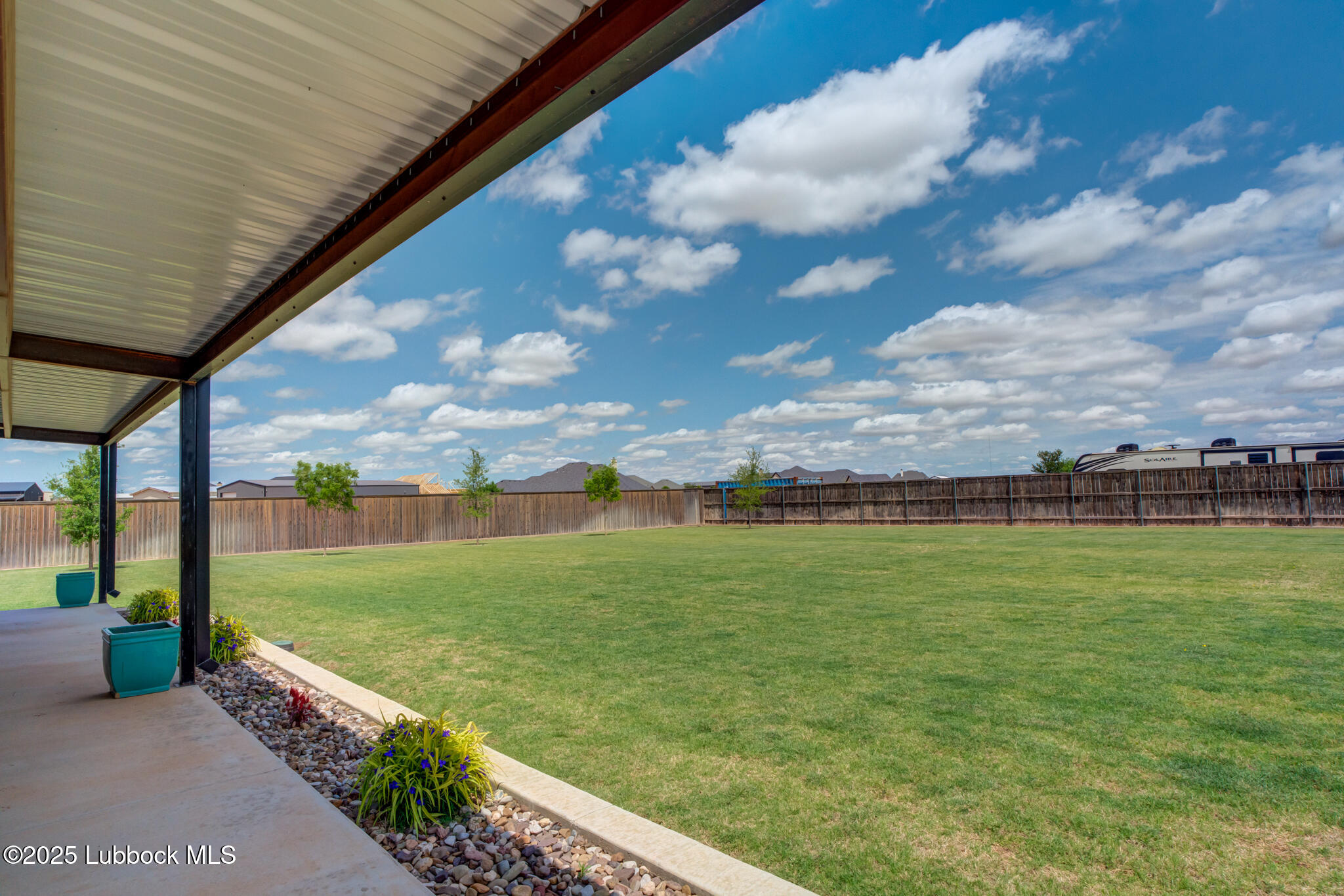 5004 County Road 7640 Lubbock, TX 79424 - Photo 70 of 79 a view of a golf course with a big yard