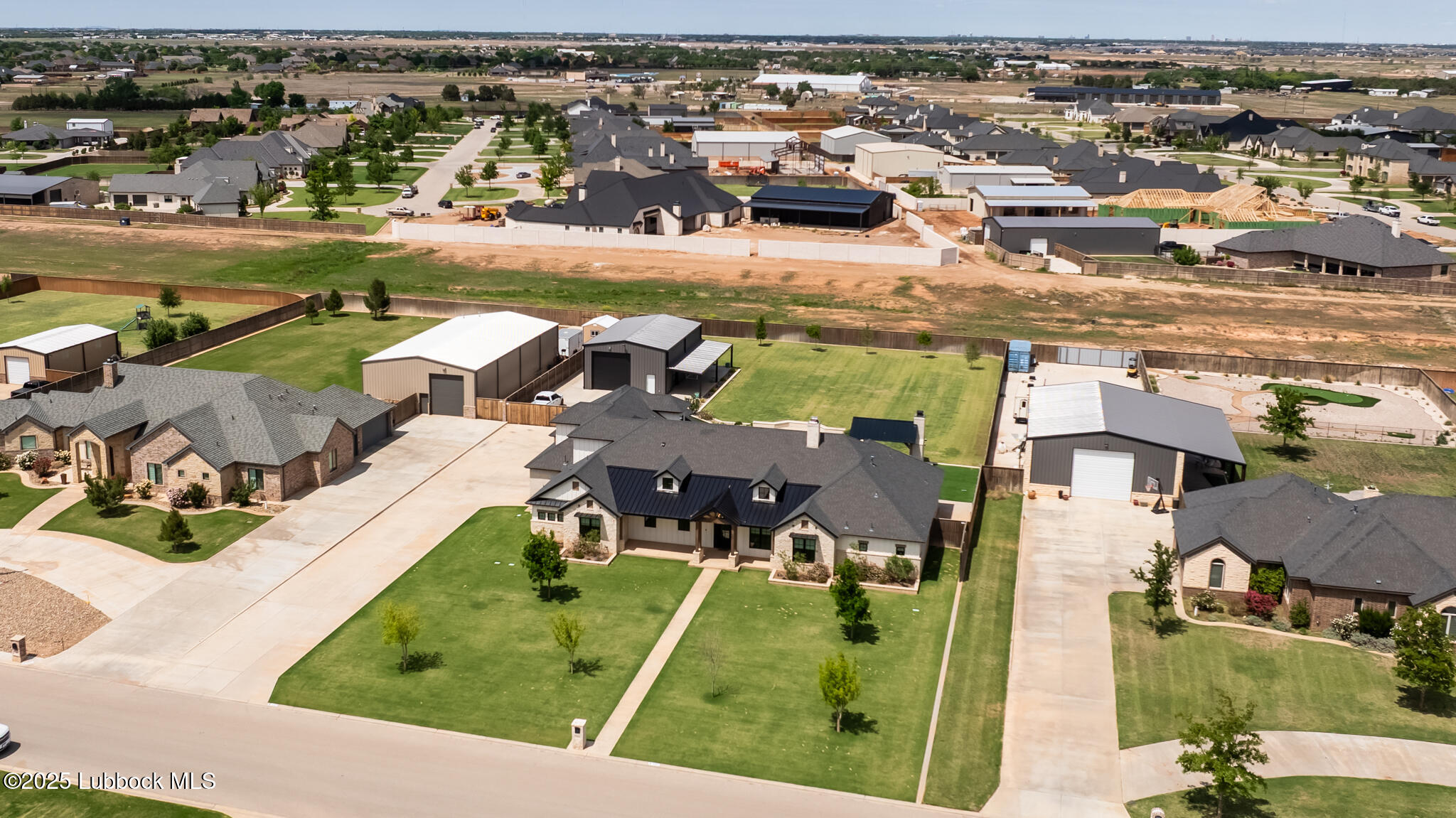5004 County Road 7640 Lubbock, TX 79424 - Photo 76 of 79 an aerial view of a house with a lake view