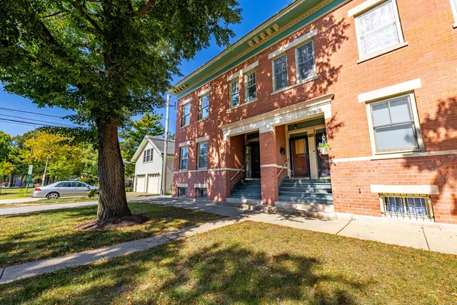 a view of a building with brick walls