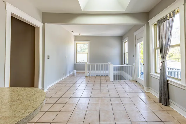 a view of a room with windows