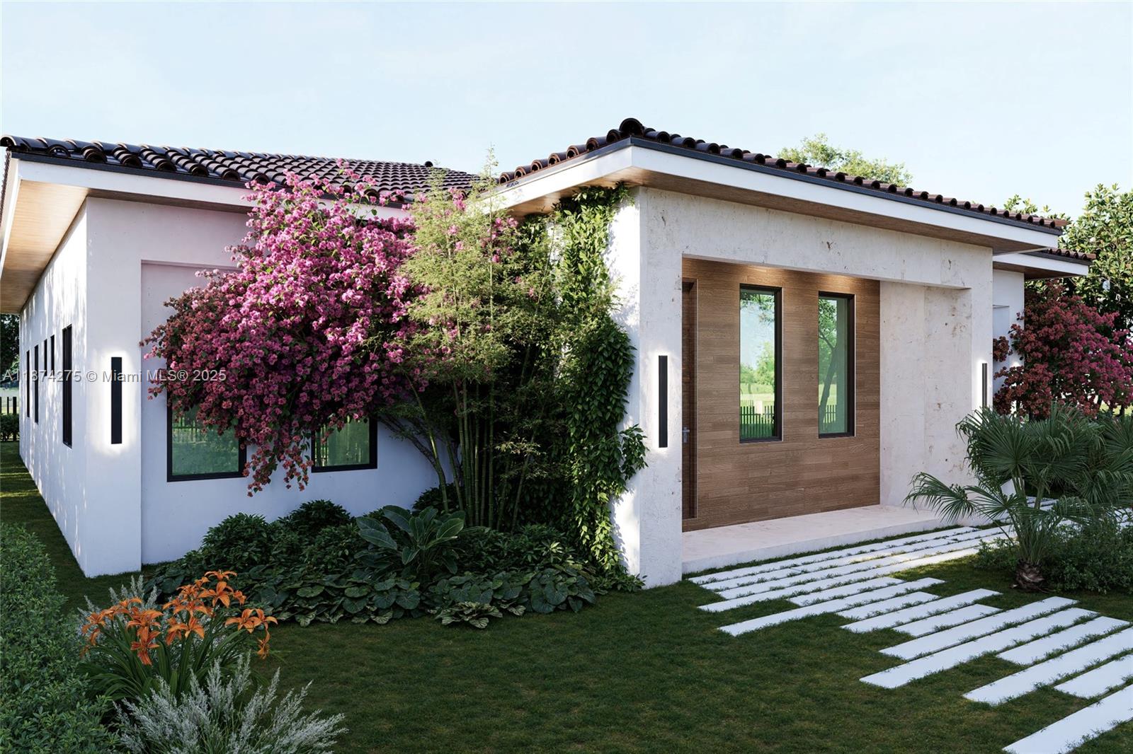 a front view of a house with garden