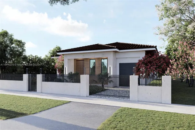 a front view of a house with a garden