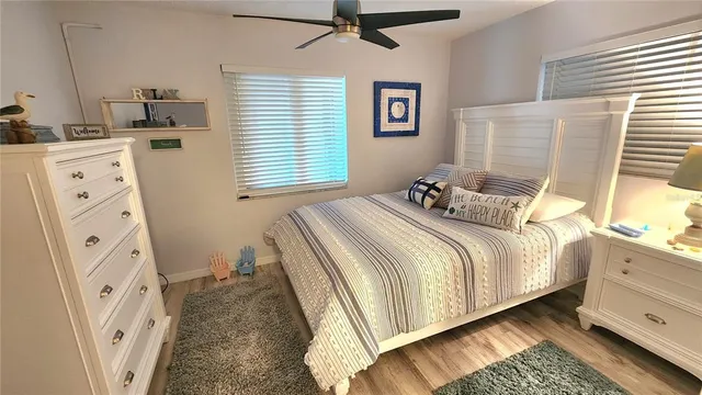 a spacious bathroom with a double vanity sink toilet and shower