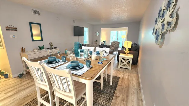 a kitchen with a sink stove and refrigerator