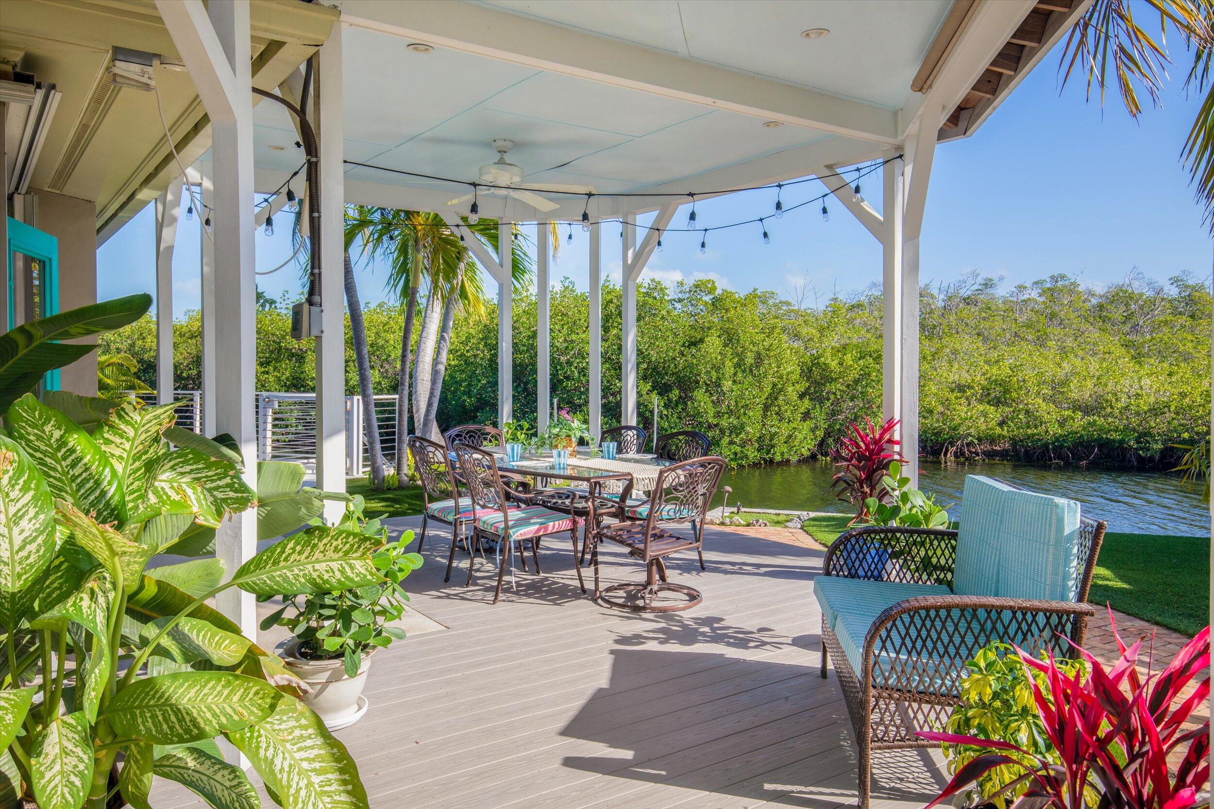 3446 Riviera Drive Key West, FL 33040 - Photo 13 of 73 a outdoor view with a sitting space