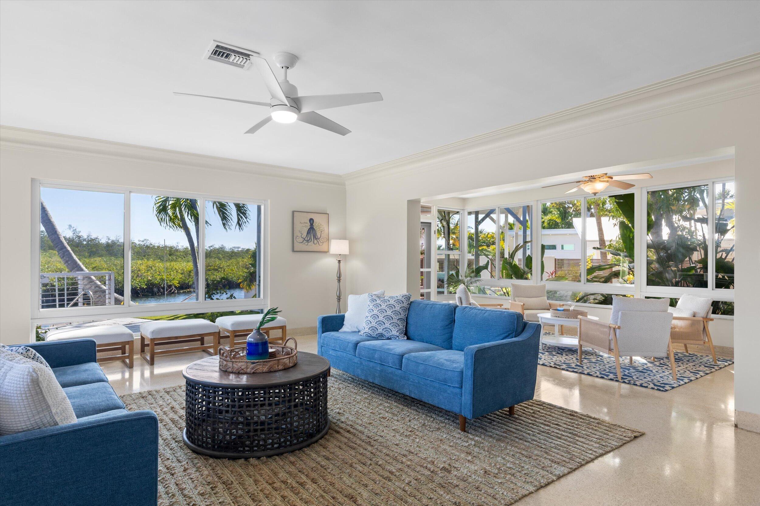 3446 Riviera Drive Key West, FL 33040 - Photo 25 of 73 a living room with furniture and a large window