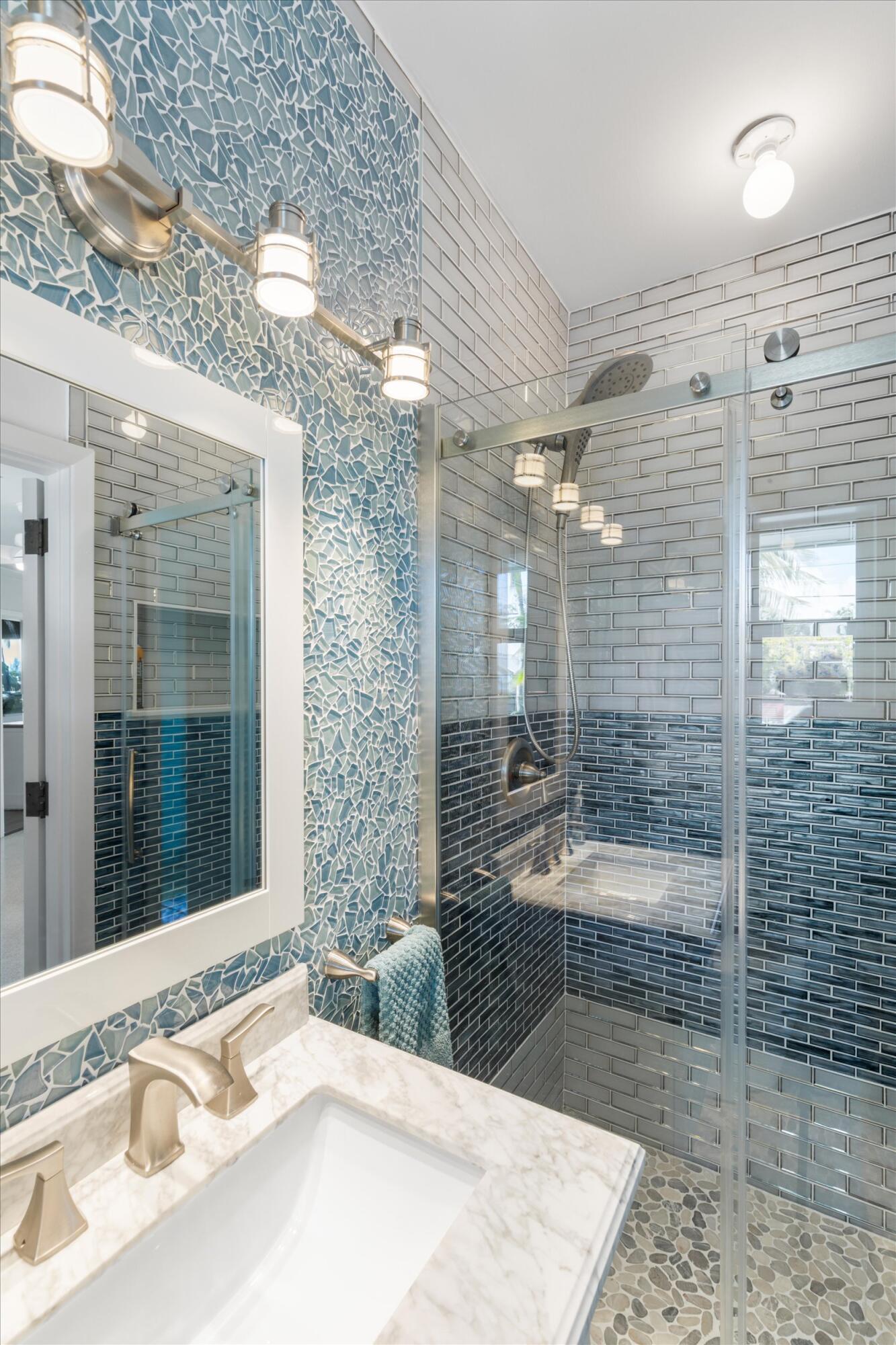 3446 Riviera Drive Key West, FL 33040 - Photo 37 of 73 a bathroom with a tub sink and mirror
