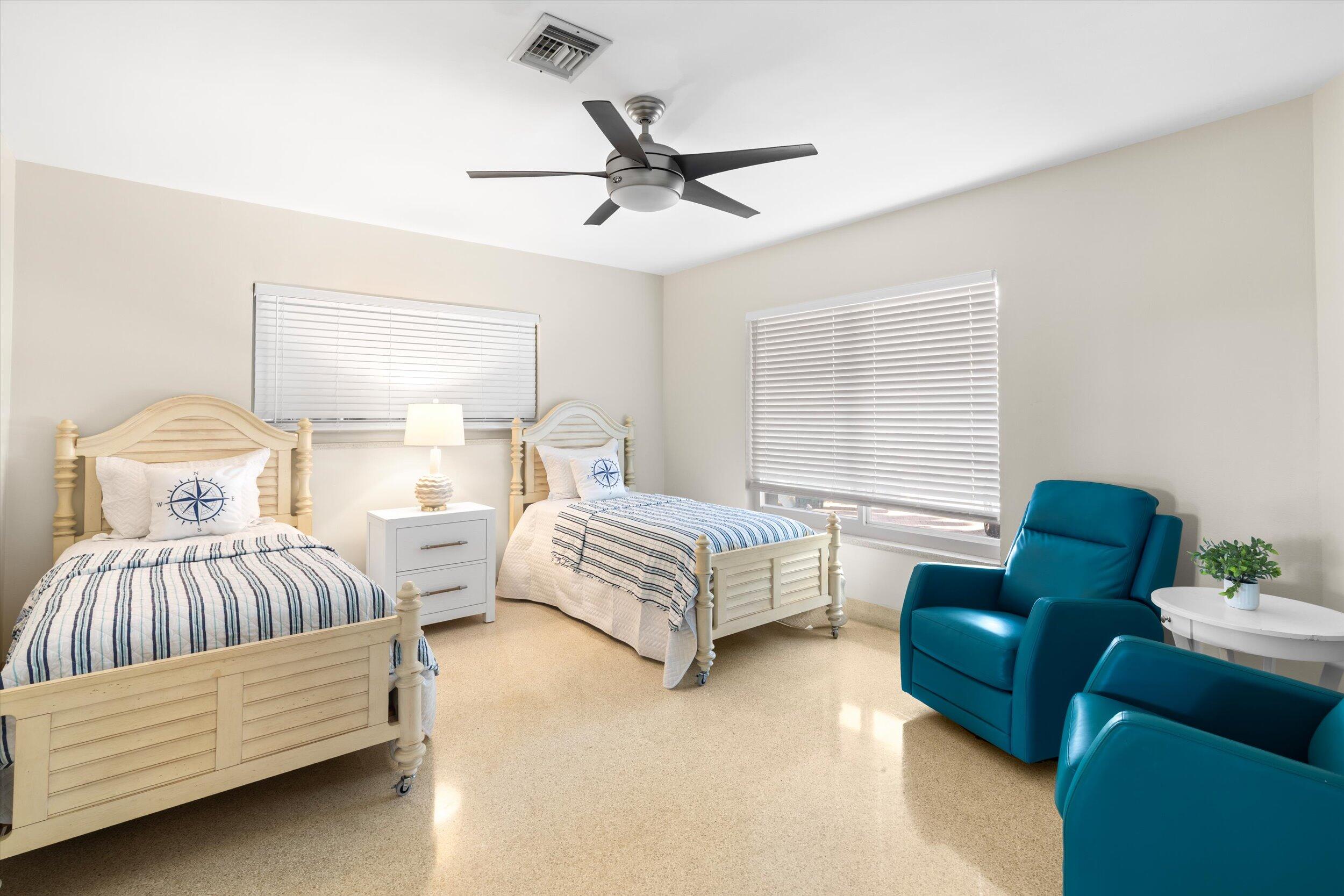 3446 Riviera Drive Key West, FL 33040 - Photo 55 of 73 a bedroom with furniture and a large window