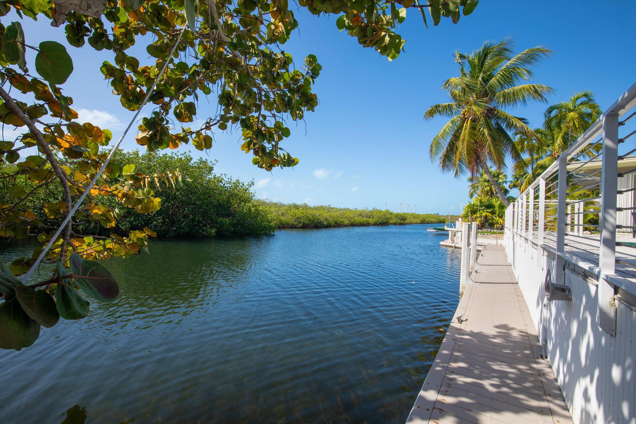 3446 Riviera Drive Key West, FL 33040 - Photo 9 of 73 a view of a balcony with lake view