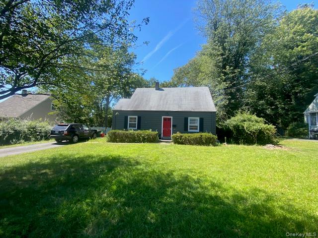 58 Lexington Road Tappan, NY 10983 - Photo 1 of 1 View of front of property with a front lawn and a chimney