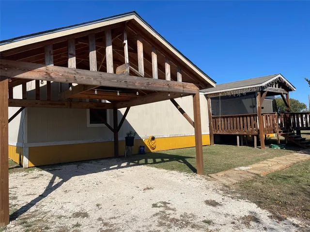 a view of an outdoor space with porch area