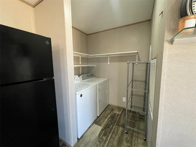 wooden floor and window in an empty room