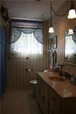 2030 Gentle Road Lewisburg, TN 37091 - Photo 15 of 20 3rd bath is upstairs between two bedrooms, vinyl floors, large vanity and tub/shower combo.
