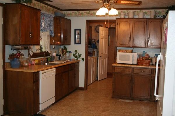 2030 Gentle Road Lewisburg, TN 37091 - Photo 7 of 20 Big country kitchen with dishwasher, window w/sink, and lots of cabinets. View of utility room.