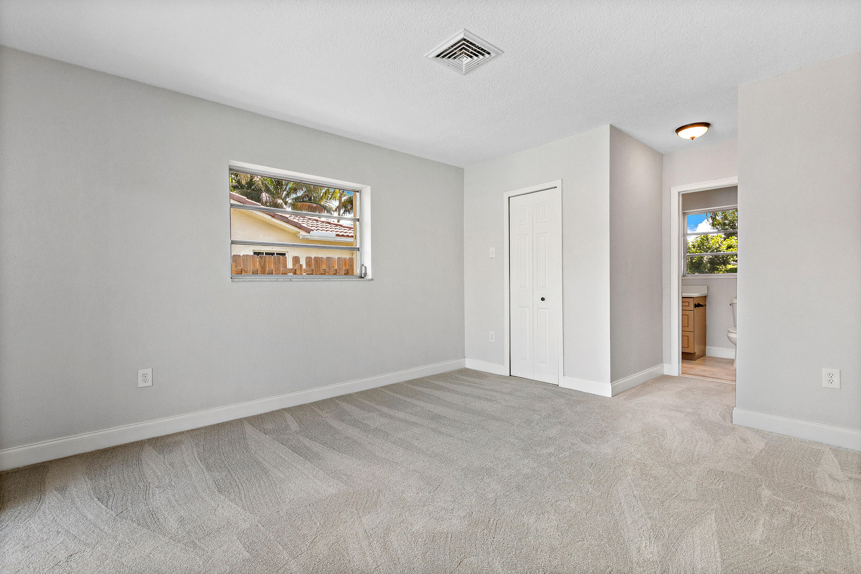 871 Northwest 7th Street Boca Raton, FL 33486 - Photo 12 of 21 wooden floor in an empty room