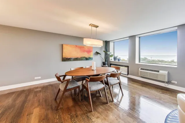 a kitchen with a sink a stove and cabinets