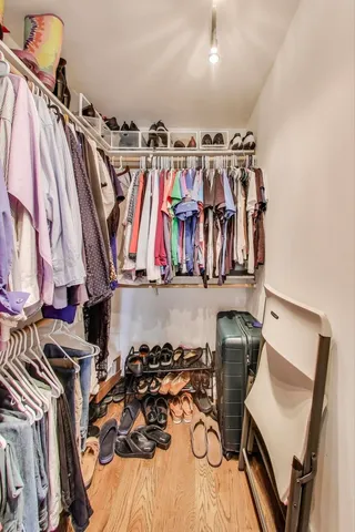 a view of a livingroom with wooden floor