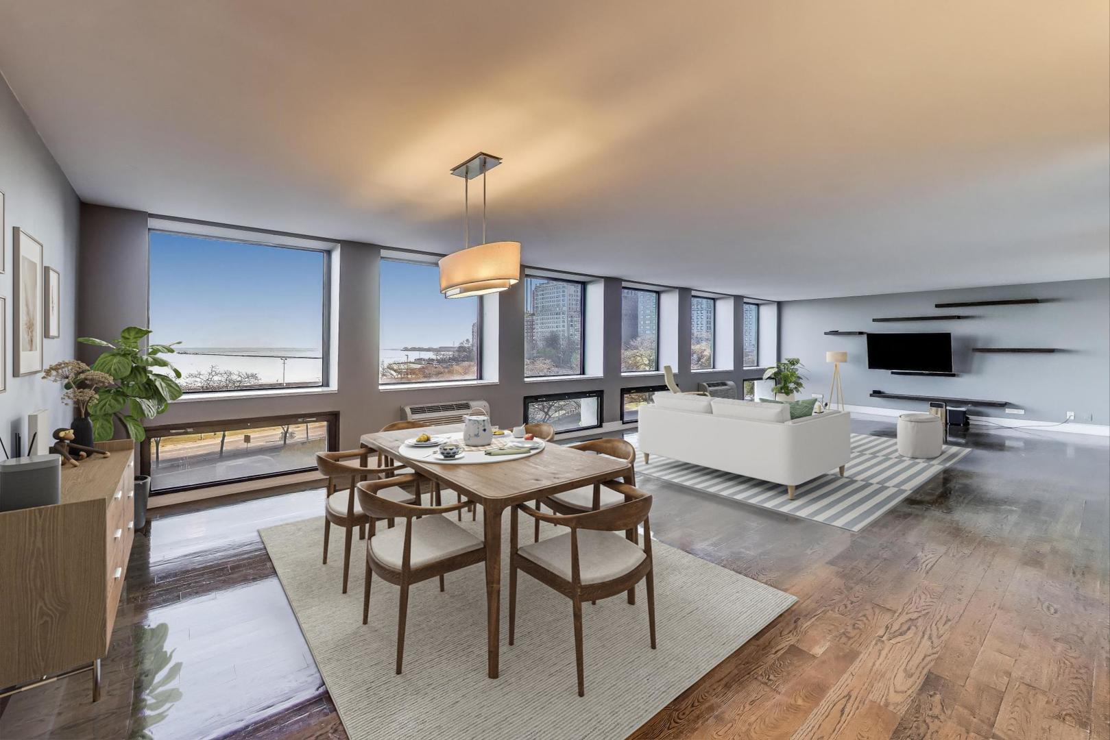1110 North Lake Shore Drive, Unit 3N Chicago, IL 60611 - Photo 3 of 45 a view of a dining room with furniture and wooden floor
