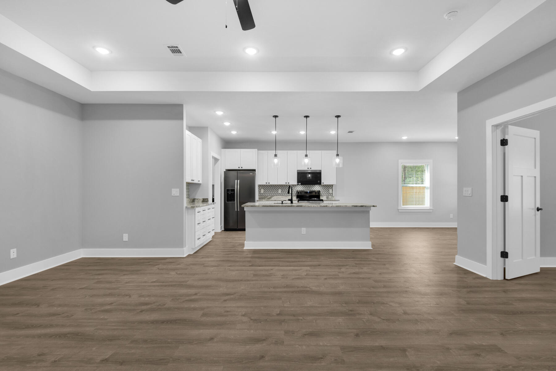 363 Washington Valparaiso, FL 32580 - Photo 11 of 35 a view of kitchen with kitchen island and stainless steel appliances