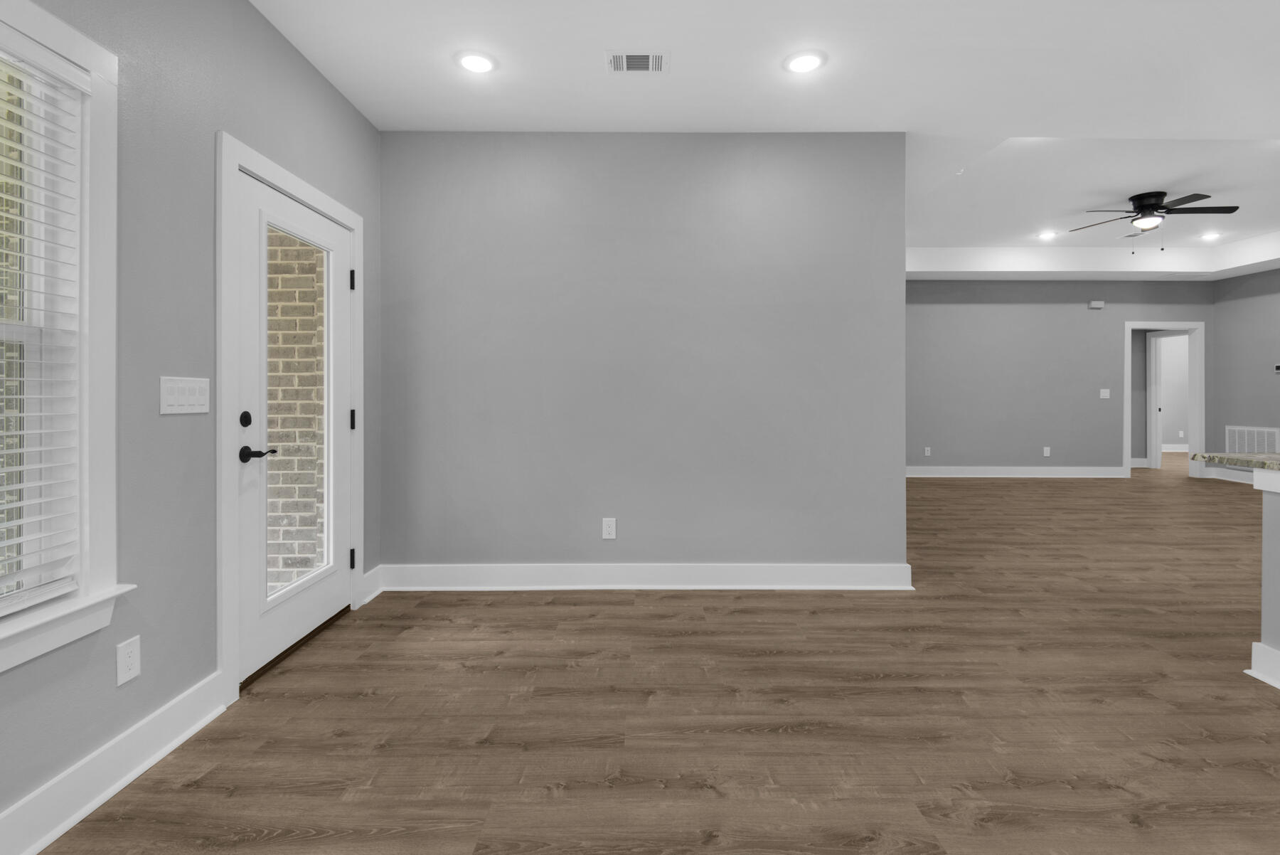 363 Washington Valparaiso, FL 32580 - Photo 20 of 35 wooden floor in an empty room with a window