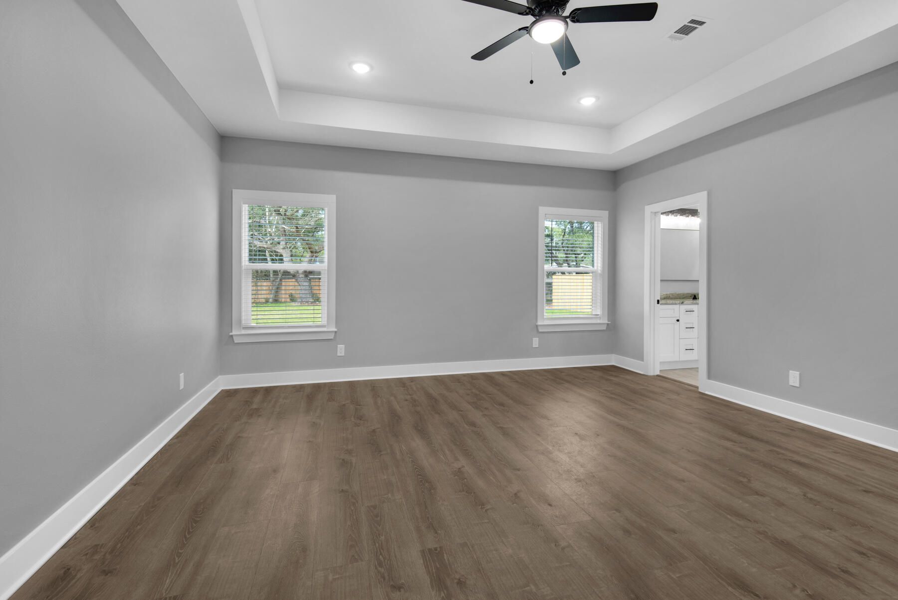 363 Washington Valparaiso, FL 32580 - Photo 21 of 35 wooden floor in an empty room with a window