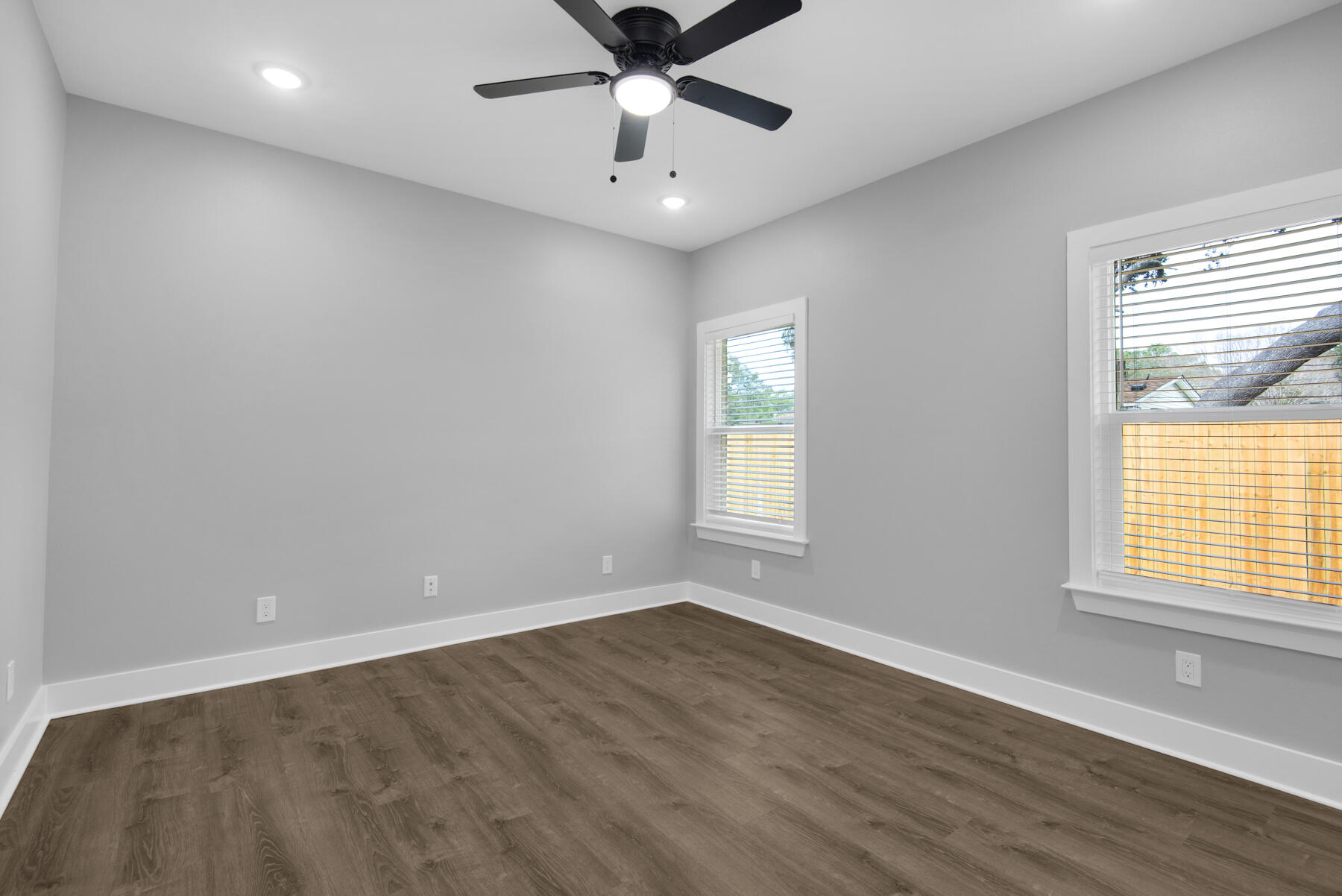 363 Washington Valparaiso, FL 32580 - Photo 30 of 35 wooden floor in an empty room with a window