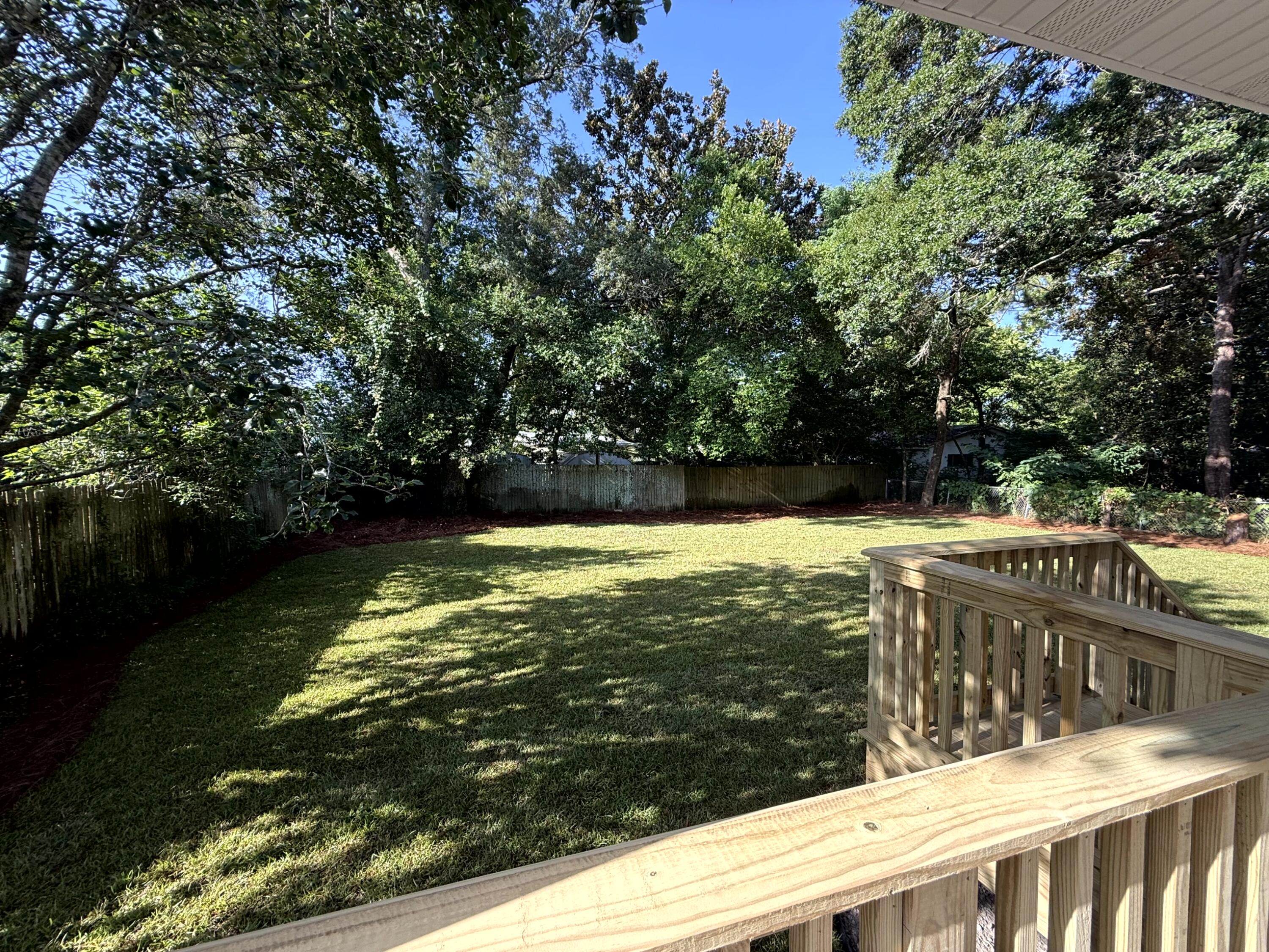 363 Washington Valparaiso, FL 32580 - Photo 4 of 35 a view of a swimming pool with a lake view