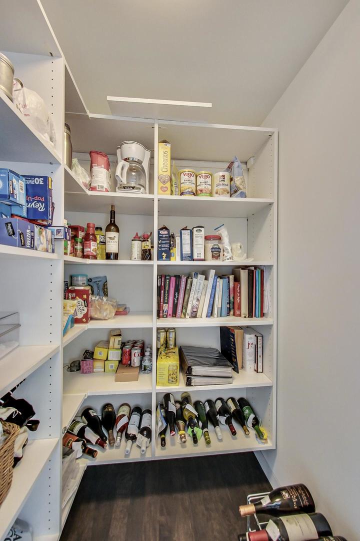 Undisclosed Address Chicago, IL 60611 - Photo 15 of 50 a room with lots of different kinds of food