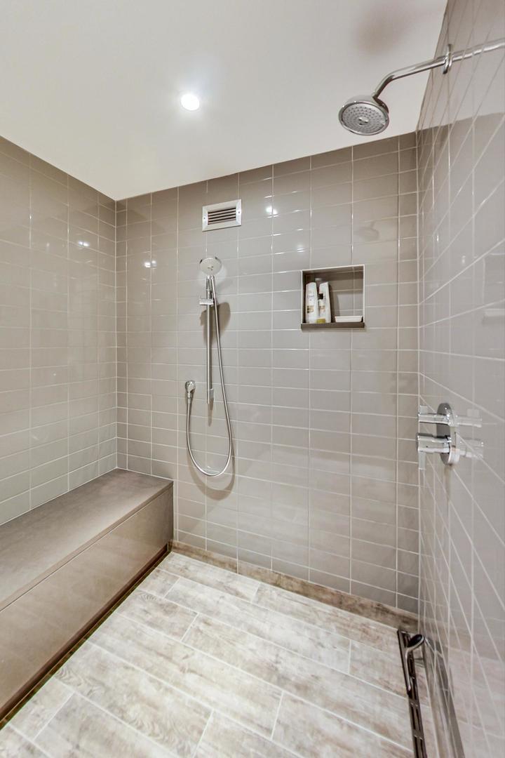 Undisclosed Address Chicago, IL 60611 - Photo 29 of 50 a bathroom with a shower