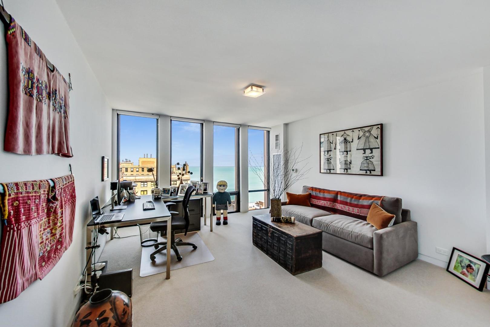 Undisclosed Address Chicago, IL 60611 - Photo 34 of 50 a living room with furniture and a large window