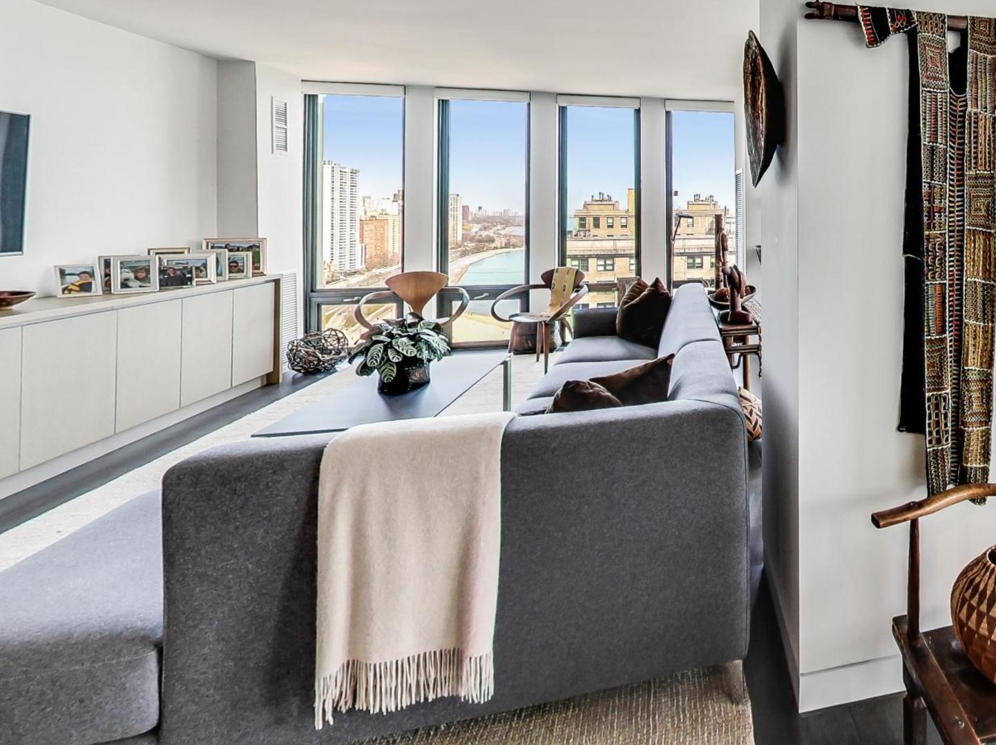 Undisclosed Address Chicago, IL 60611 - Photo 5 of 50 a living room with furniture and a large window