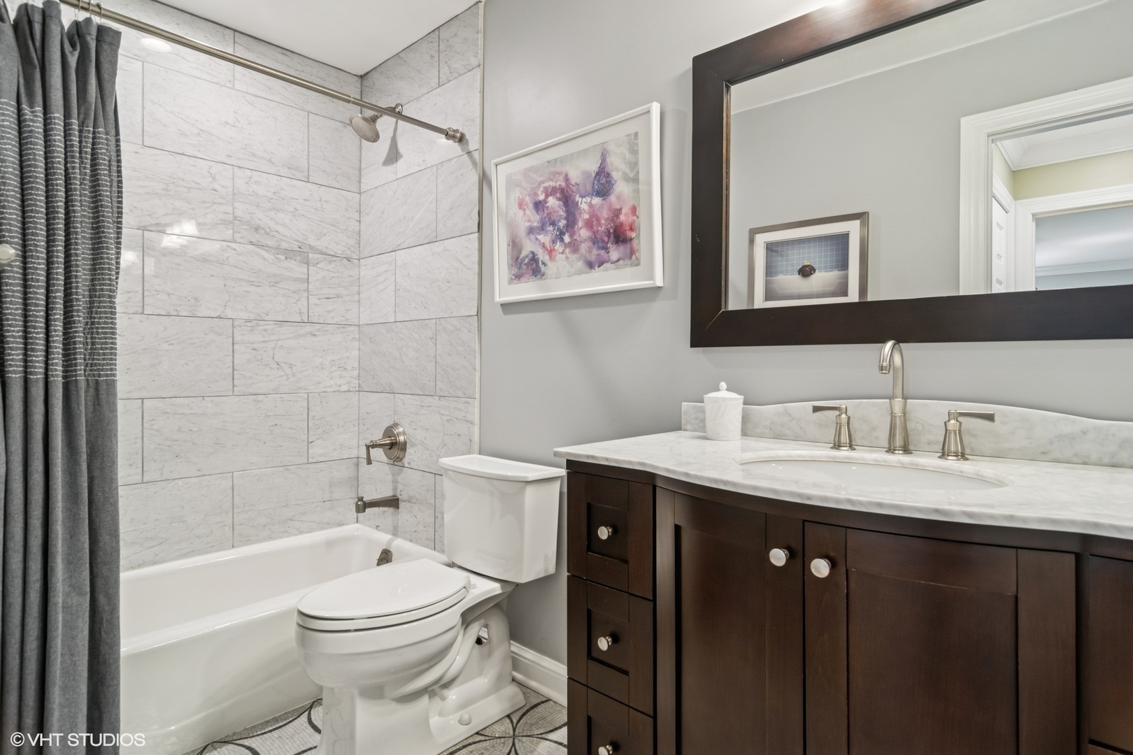 1606 North Mohawk Street, Unit B Chicago, IL 60614 - Photo 21 of 29 a bathroom with a granite countertop sink mirror toilet and bathtub