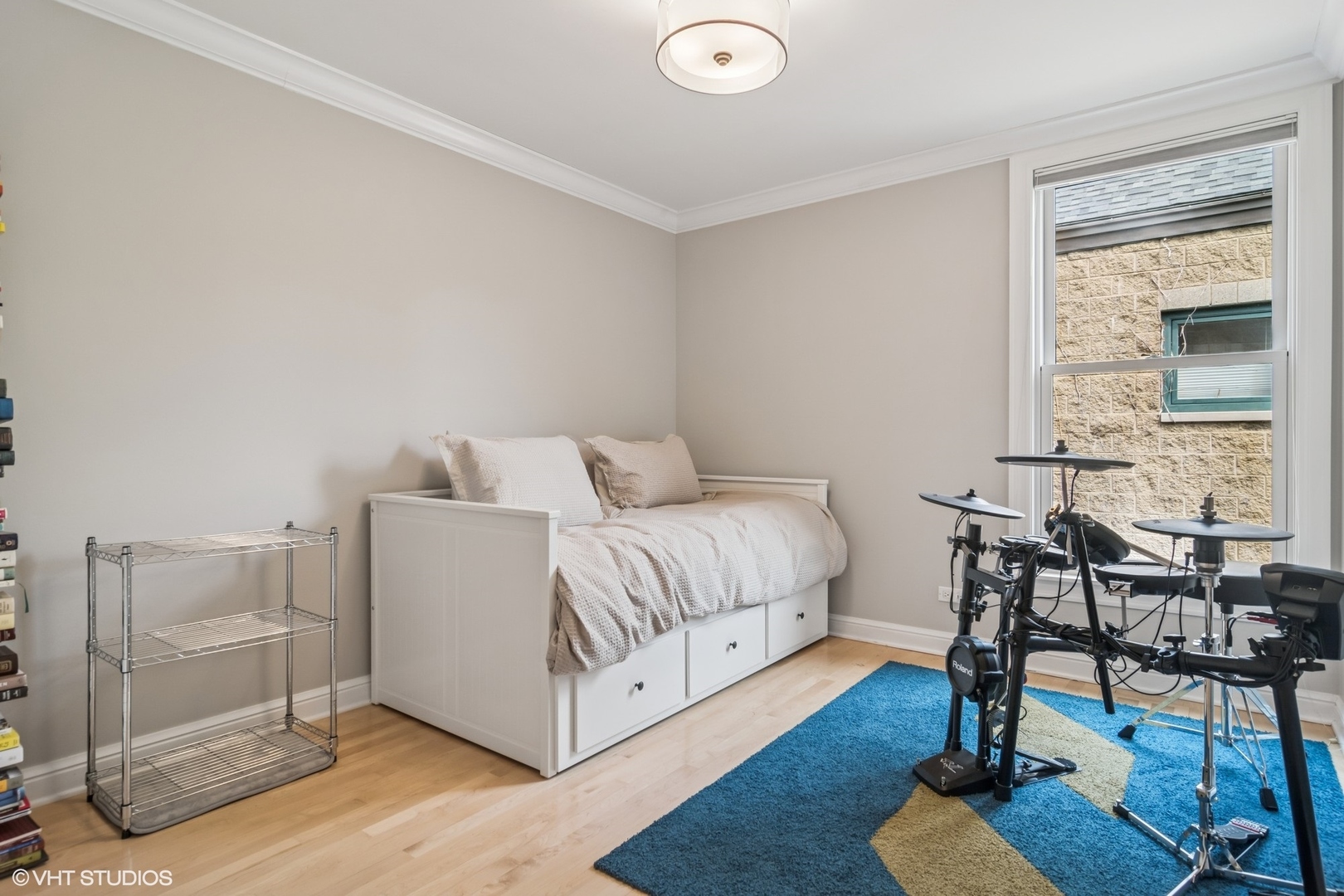 1606 North Mohawk Street, Unit B Chicago, IL 60614 - Photo 22 of 29 a bed room with a bed and a chair