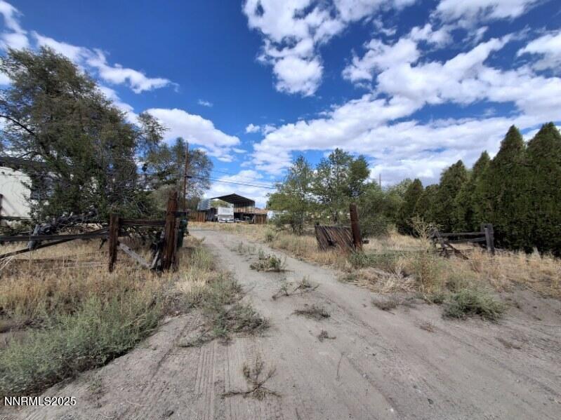 17845 Owl Court Reno, NV 89508 - Photo 2 of 14 a view of a dry yard with trees